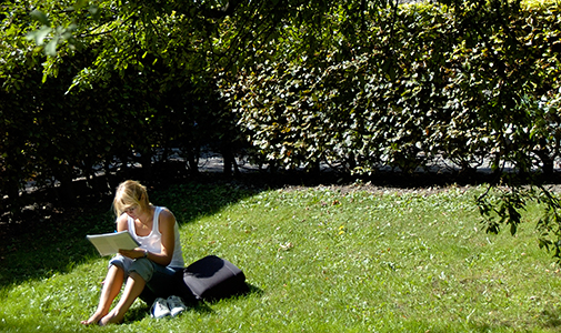 Student reading in 'the secret garden'